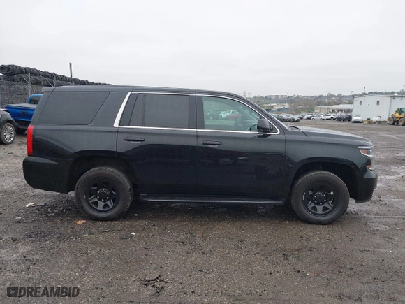 2015 Chevrolet Tahoe Commercial with VIN 1GNSK2EC8FR570602, listed as a IAAI auction lot 41977021 with 115,866 mi miles. Bid and sale history available at carsss.com. Image 13.