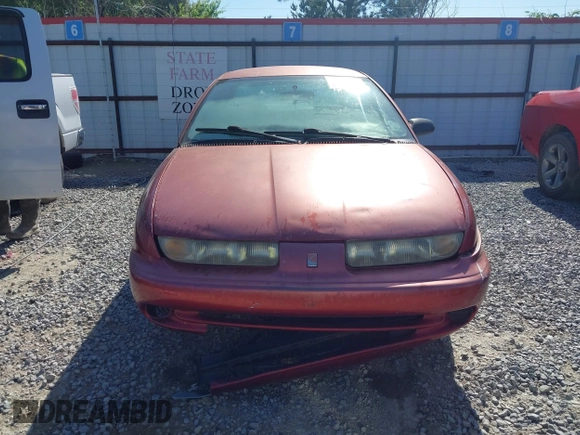 1998 Saturn SL z VIN 1G8ZK5270WZ223002, wystawiony jako IAAI lot #41959507 z przebiegiem Nie podano mil oraz . Historia ofert i sprzedaży dostępna na DreamBid. Obrazek 12.