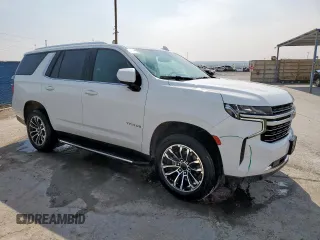 2021 Chevrolet Tahoe LT with VIN 1GNSCNKDXMR263862, listed as a Copart auction lot 58743585 with 131,743 mi miles and Clean title. Bid and sale history available at DreamBid. Image 4.
