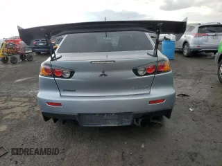 2014 Mitsubishi Lancer Evolution GSR with VIN JA32W8FVXEU000210, listed as a Copart auction lot 87228694 with 120,356 mi miles and Salvage Title. Bid and sale history available at carsss.com. Image 6.