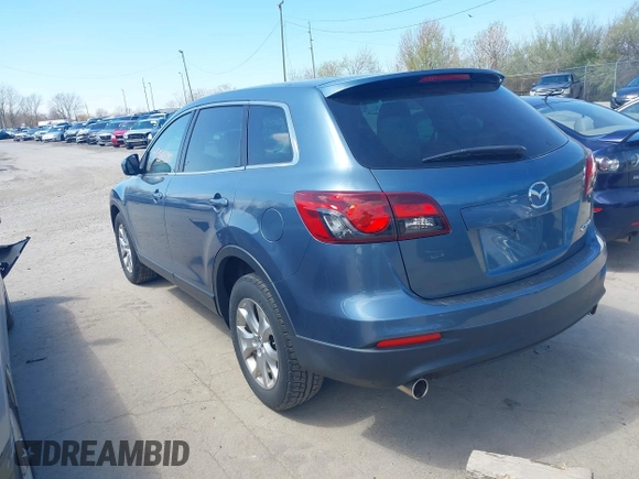 2015 Mazda CX-9 Sport with VIN JM3TB2BV7F0458193, listed as a IAAI auction lot 41886385 with 154,677 mi miles and . Bid and sale history available at carsss.com. Image 3.