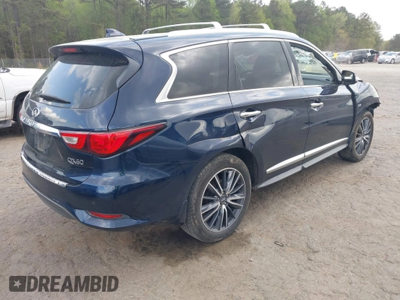 2017 Infiniti QX60 with VIN 5N1DL0MM3HC504232, listed as a IAAI auction lot 41940671 with 156,488 mi miles and . Bid and sale history available at DreamBid. Image 4.