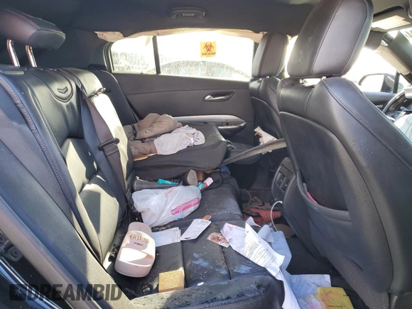 2020 Cadillac XT4 FWD Premium Luxury z VIN 1GYFZCR4XLF070463, wystawiony jako Copart lot #86223304 z przebiegiem Nie podano mil oraz Nie do naprawy • Non repairable. Historia ofert i sprzedaży dostępna na DreamBid. Obrazek 11.