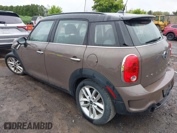 2014 MINI Countryman S with VIN WMWZC5C54EWM17898, listed as a IAAI auction lot 42343469 with 112,773 mi miles and . Bid and sale history available at DreamBid. Image 3.