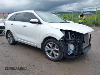 2016 Kia Sorento SXL with VIN 5XYPKDA57GG174551, listed as a IAAI auction lot 42314487 with 86,606 mi miles and . Bid and sale history available at DreamBid. Image 1.