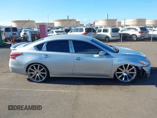 2014 Nissan Altima S with VIN 1N4AL3AP8EN343583, listed as a IAAI auction lot 41989981 with 103,012 mi miles and . Bid and sale history available at DreamBid. Image 14.