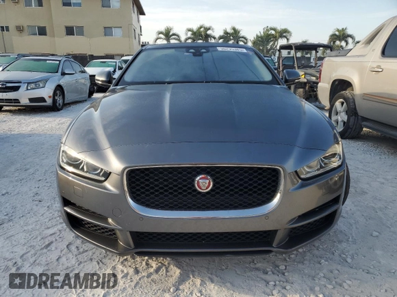 2017 Jaguar XE with VIN SAJAJ4BN7HA978102, listed as a Copart auction lot 50295385 with 161,356 mi miles and Clean Title. Bid and sale history available at DreamBid. Image 5.