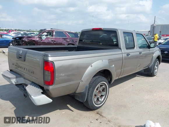 2004 Nissan Frontier XE z VIN 1N6ED29X04C467975, wystawiony jako IAAI lot #42168457 z przebiegiem 171 354 mil mil oraz . Historia ofert i sprzedaży dostępna na DreamBid. Obrazek 4.