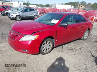 2007 Toyota Camry LE with VIN 4T1BK46KX7U022119, listed as a IAAI auction lot 41833893 with 174,598 mi miles and . Bid and sale history available at DreamBid. Image 2.