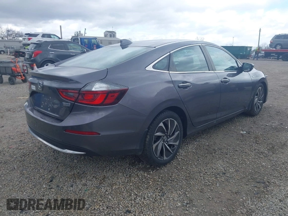 2021 Honda Insight Touring with VIN 19XZE4F91ME005517, listed as a IAAI auction lot 42036493 with 65,404 mi miles and . Bid and sale history available at carsss.com. Image 4.