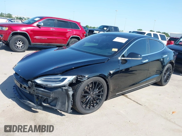 2021 Tesla Model S Long Range Plus with VIN 5YJSA1E28MF426080, listed as a IAAI auction lot 41979326 with 125,328 mi miles and . Bid and sale history available at DreamBid. Image 20.