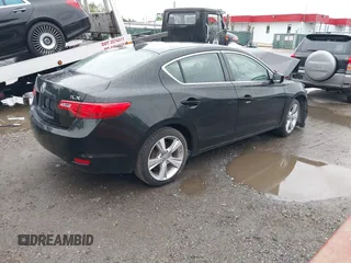 2013 Acura ILX Technology with VIN 19VDE1F71DE004528, listed as a IAAI auction lot 42232791 with 85,025 mi miles and . Bid and sale history available at DreamBid. Image 4.