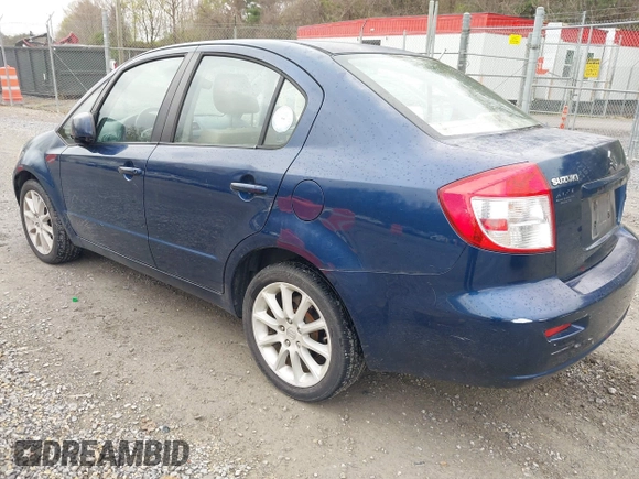 2011 Suzuki SX4 LE with VIN JS2YC5A23B6304713, listed as a IAAI auction lot 41997287 with 114,024 mi miles. Bid and sale history available at carsss.com. Image 3.