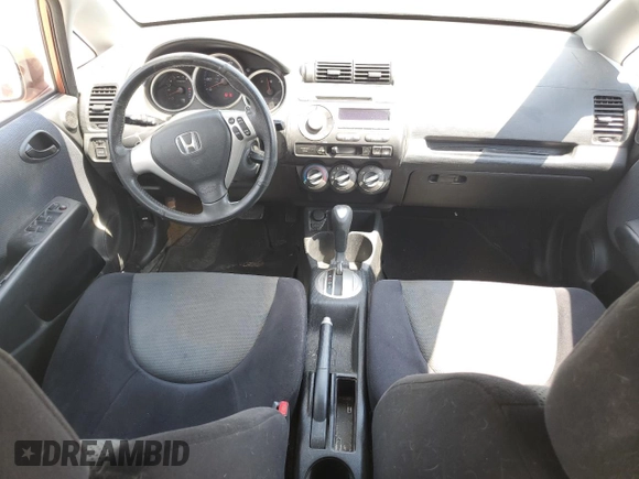 2007 Honda Fit Sport with VIN JHMGD38667S047110, listed as a Copart auction lot 69097094 with 231,662 mi miles and Salvage Title. Bid and sale history available at carsss.com. Image 8.
