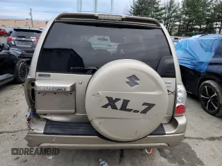 2004 Suzuki XL7 LX z VIN JS3TX92V744100442, wystawiony jako Copart lot #84847614 z przebiegiem 82 751 mil mil oraz Szkody całkowita. Historia ofert i sprzedaży dostępna na DreamBid. Obrazek 6.