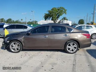2013 Nissan Altima 3.5 SL with VIN 1N4BL3APXDN433871, listed as a IAAI auction lot 42039383 with 161,200 mi miles. Bid and sale history available at carsss.com. Image 14.