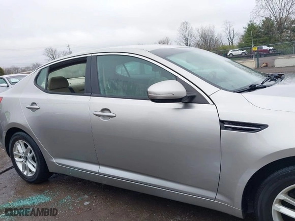 2011 Kia Optima LX with VIN KNAGM4A76B5146718, listed as a IAAI auction lot 42006225 with 213,939 mi miles. Bid and sale history available at carsss.com. Image 13.