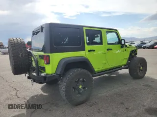2012 Jeep Wrangler Unlimited Call of Duty MW3 z VIN 1C4BJWFG4CL242211, wystawiony jako Copart lot #59774555 z przebiegiem 117 463 mil mil oraz Szkoda całkowita • Salvage title. Historia ofert i sprzedaży dostępna na DreamBid. Obrazek 3.