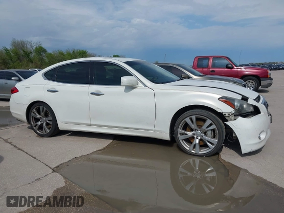 2013 Infiniti M with VIN JN1BY1AP4DM511067, listed as a IAAI auction lot 41890196 with 316,837 mi miles and . Bid and sale history available at DreamBid. Image 13.