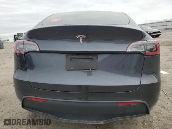 2024 Tesla Model Y с VIN 7SAYGDED1RF092027, выставлен на аукционе Copart как лот 51655485 с пробегом 22 010 миль миль и Списание • Salvage title. История ставок и продаж доступна на DreamBid. Изображение 6.
