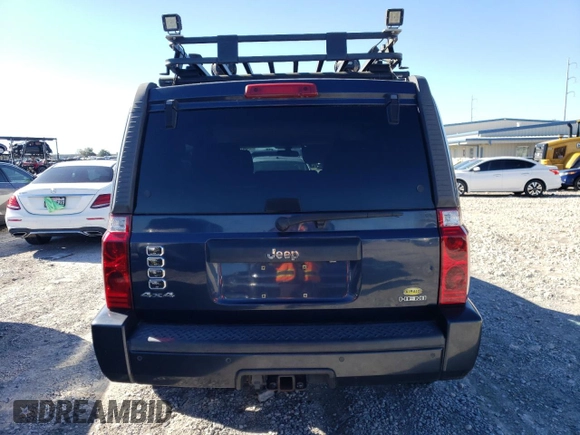 2010 Jeep Commander Sport z VIN 1J4RG4GT8AC139104, wystawiony jako Copart lot #84720134 z przebiegiem 167 646 mil mil oraz Szkoda całkowita • Salvage title. Historia ofert i sprzedaży dostępna na DreamBid. Obrazek 6.