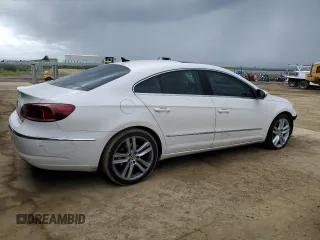 2013 Volkswagen CC Lux with VIN WVWRP7AN8DE548746, listed as a Copart auction lot 51111455 with 131,974 mi miles and Salvage title. Bid and sale history available at DreamBid. Image 3.