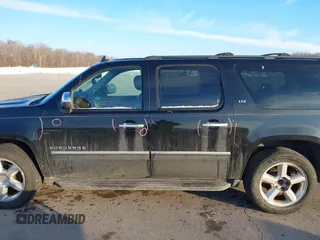 2010 Chevrolet Suburban LTZ with VIN 1GNUKKE3XAR142743, listed as a IAAI auction lot 41413380 with 236,384 mi miles. Bid and sale history available at carsss.com. Image 14.