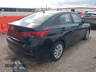 2021 Hyundai Accent SE with VIN 3KPC24A62ME147077, listed as a IAAI auction lot 42013901 with 59,363 mi miles. Bid and sale history available at carsss.com. Image 4.