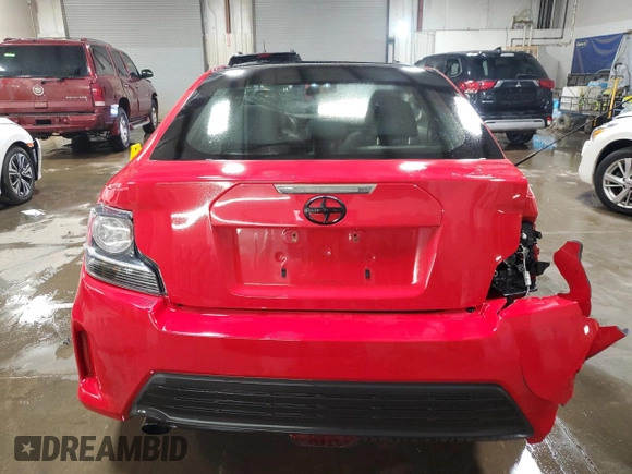 2014 Scion tC z VIN JTKJF5C71E3072025, wystawiony jako Copart lot #51967285 z przebiegiem 187 091 mil mil oraz Szkody całkowita. Historia ofert i sprzedaży dostępna na DreamBid. Obrazek 6.