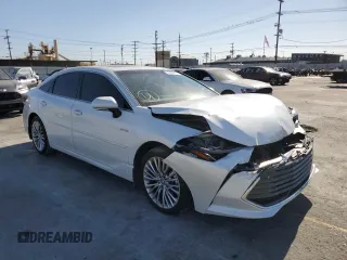 2020 Toyota Avalon Limited Hybrid z VIN 4T1D21FB9LU013719, wystawiony jako Copart lot #65184172 z przebiegiem 18 714 mil mil oraz . Historia ofert i sprzedaży dostępna na DreamBid. Obrazek 1.
