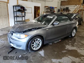 2011 BMW 1 Series 128i with VIN WBAUN1C59BVH83518, listed as a Copart auction lot 85974634 with 35,650 mi miles and Salvage Title. Bid and sale history available at carsss.com. Image 1.