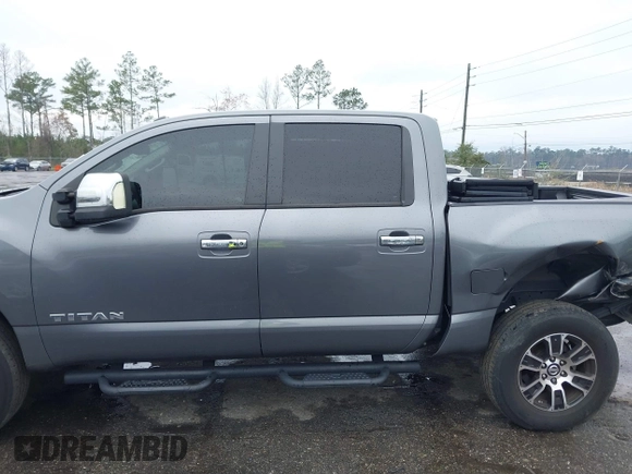 2021 Nissan Titan SV z VIN 1N6AA1EF2MN535695, wystawiony jako IAAI lot #41655071 z przebiegiem 48 727 mil mil oraz . Historia ofert i sprzedaży dostępna na DreamBid. Obrazek 14.