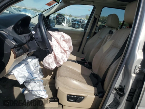 2013 Land Rover LR2 with VIN SALFR2BG9DH337045, listed as a Copart auction lot 54263235 with 69,604 mi miles and Salvage title. Bid and sale history available at DreamBid. Image 7.