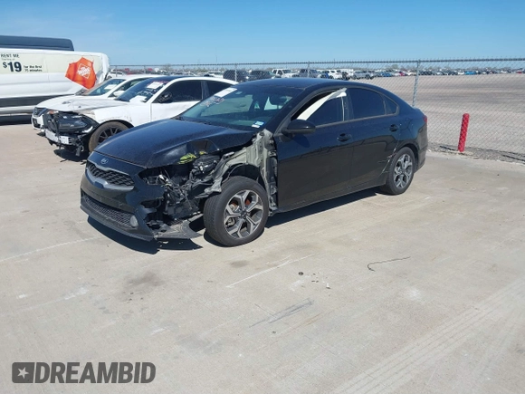 2021 Kia Forte LXS with VIN 3KPF24AD8ME297528, listed as a IAAI auction lot 41007684 with 90,108 mi miles and . Bid and sale history available at carsss.com. Image 2.