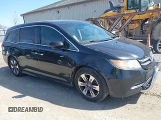 2014 Honda Odyssey EX-L z VIN 5FNRL5H67EB039844, wystawiony jako IAAI lot #41824724 z przebiegiem 275 281 mil mil oraz . Historia ofert i sprzedaży dostępna na DreamBid. Obrazek 1.