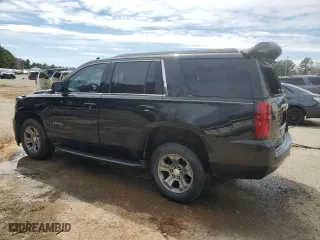2019 Chevrolet Tahoe LS with VIN 1GNSCAKC8KR105890, listed as a Copart auction lot 48083415 with 146,890 mi miles and Salvage Title. Bid and sale history available at carsss.com. Image 2.