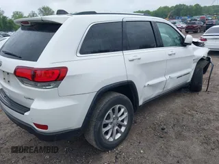 2021 Jeep Grand Cherokee Laredo E with VIN 1C4RJFAG7MC620710, listed as a IAAI auction lot 42255694 with 51,989 mi miles and . Bid and sale history available at DreamBid. Image 4.