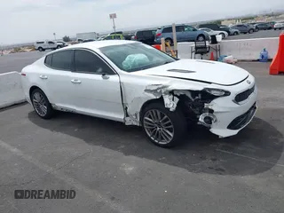 2018 Kia Stinger with VIN KNAE15LA8J6031125, listed as a IAAI auction lot 41928665 with 82,003 mi miles. Bid and sale history available at carsss.com. Image 1.