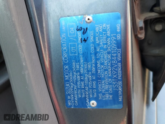 2004 Suzuki XL7 LX with VIN JS3TX92V844109991, listed as a Copart auction lot 58934415 with 205,951 mi miles and Salvage title. Bid and sale history available at DreamBid. Image 14.