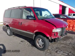 1999 Chevrolet Astro with VIN 1GNEL19W6XB104010, listed as a IAAI auction lot 41403240 with 96,904 mi miles. Bid and sale history available at carsss.com. Image 1.