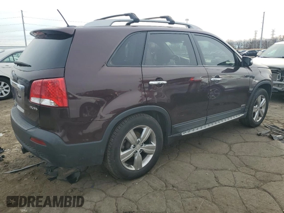 2012 Kia Sorento EX with VIN 5XYKUDA21CG201442, listed as a Copart auction lot 80690424 with 103,040 mi miles and Salvage Title. Bid and sale history available at carsss.com. Image 3.