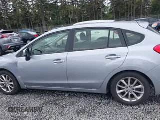 2014 Subaru Impreza Premium z VIN JF1GPAC63E8313171, wystawiony jako IAAI lot #42270472 z przebiegiem 176 818 mil mil oraz . Historia ofert i sprzedaży dostępna na DreamBid. Obrazek 14.