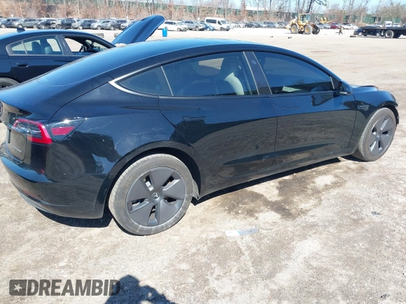 2023 Tesla Model 3 Long Range with VIN 5YJ3E1EB1PF632595, listed as a IAAI auction lot 41754131 with 8,147 mi miles and . Bid and sale history available at DreamBid. Image 4.