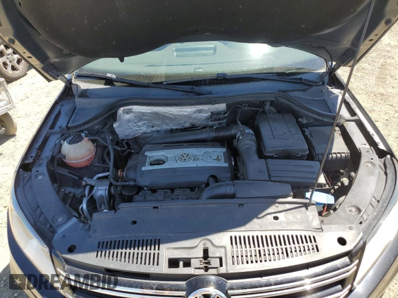2012 Volkswagen Tiguan SE z VIN WVGBV7AX1CW609299, wystawiony jako Copart lot #56359635 z przebiegiem 133 031 mil mil oraz Szkoda całkowita • Salvage title. Historia ofert i sprzedaży dostępna na DreamBid. Obrazek 12.
