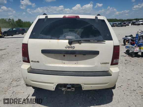 2005 Jeep Grand Cherokee Laredo with VIN 1J4GR48K05C625144, listed as a Copart auction lot 57477275 with 167,654 mi miles and Salvage title. Bid and sale history available at DreamBid. Image 6.