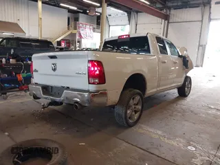 2014 Ram 1500 Big Horn with VIN 1C6RR7GT3ES367435, listed as a IAAI auction lot 42310390 with 116,181 mi miles and . Bid and sale history available at DreamBid. Image 4.