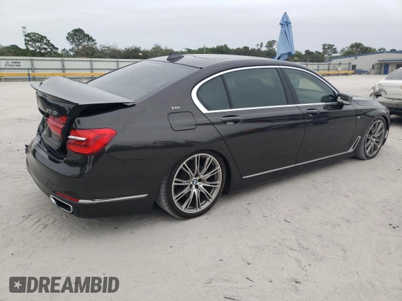 2016 BMW 7 Series 740i with VIN WBA7E2C56GG504344, listed as a Copart auction lot 79948323 with 85,993 mi miles. Bid and sale history available at carsss.com. Image 3.
