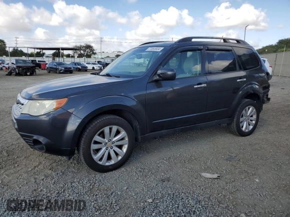 2012 Subaru Forester 2.5X Premium with VIN JF2SHADC0CG457416, listed as a Copart auction lot 77853934 with 120,905 mi miles and Salvage Title. Bid and sale history available at carsss.com. Image 1.