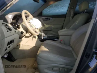 2014 Infiniti QX70 z VIN JN8CS1MW5EM412429, wystawiony jako Copart lot #82933934 z przebiegiem Nie podano mil oraz Szkoda całkowita • Salvage title. Historia ofert i sprzedaży dostępna na DreamBid. Obrazek 7.