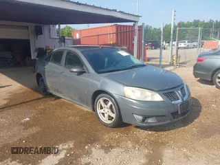 2009 Pontiac G6 1SB z VIN 1G2ZJ57KX94259405, wystawiony jako IAAI lot #42339386 z przebiegiem 300 476 mil mil oraz . Historia ofert i sprzedaży dostępna na DreamBid. Obrazek 1.